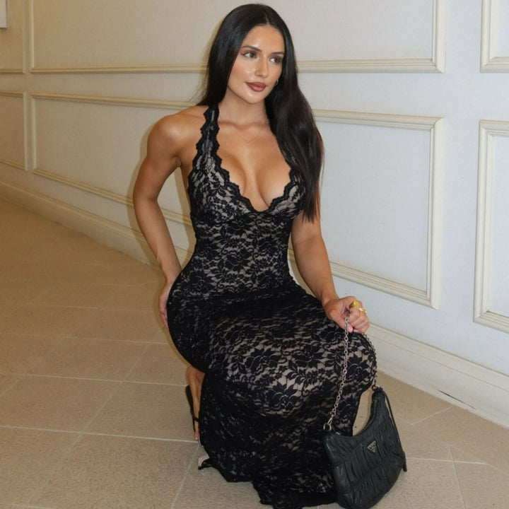 Sleek women's formal sheath dress, sleeveless with a fashionable slit. Perfect for professional evening wear.