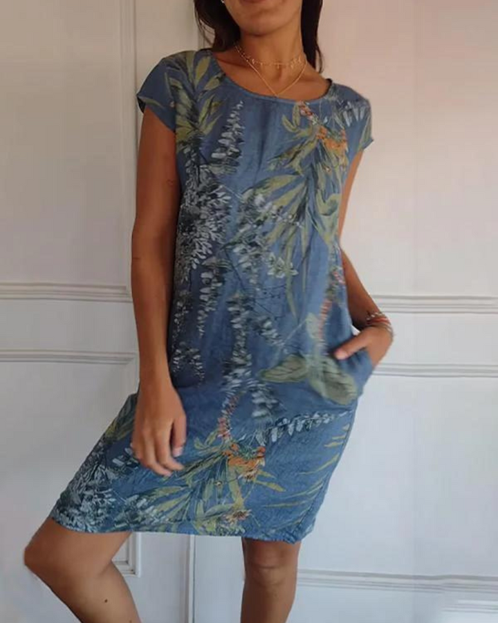 Versatile women's printed summer dress with a round neck, offering effortless style for casual days or events.