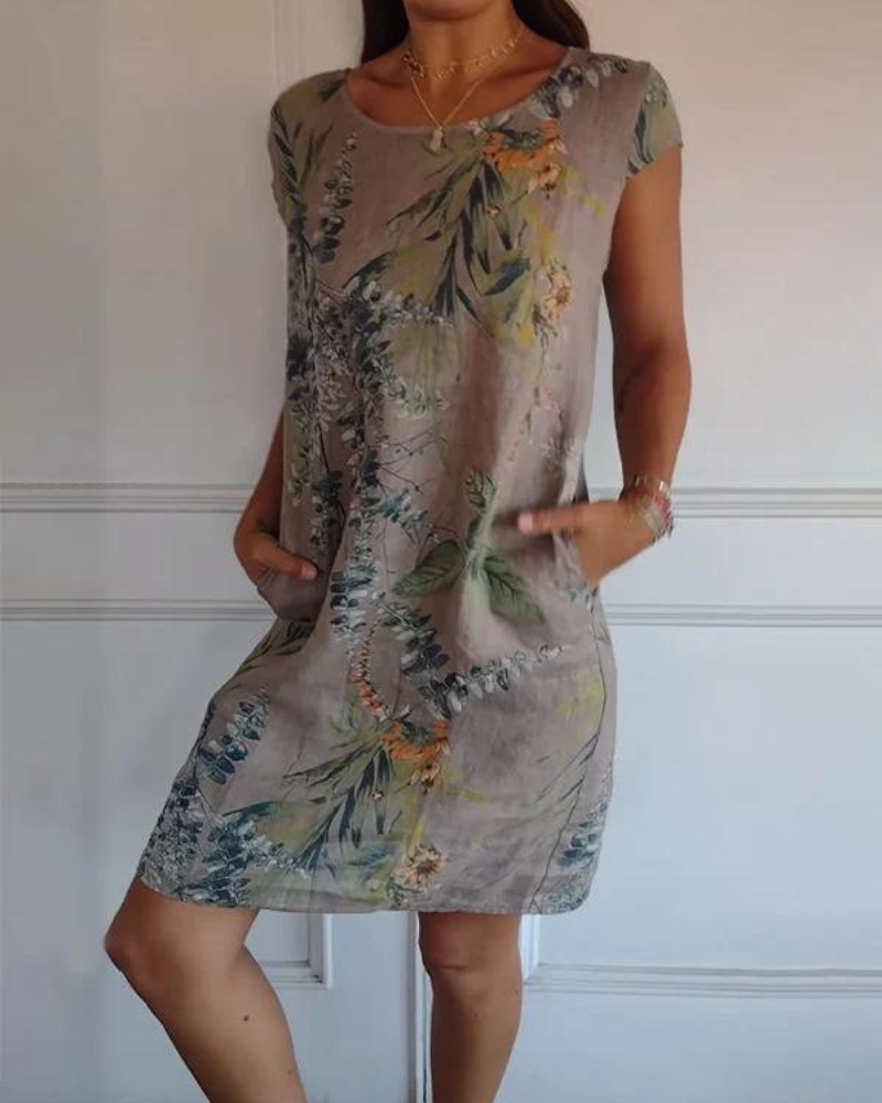 Fashionable women's elegant printed dress, ideal for a refined casual outfit or special occasions.