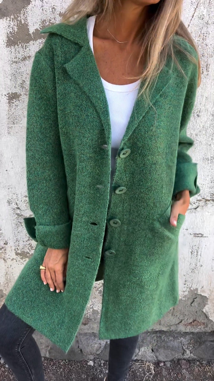 Elegant long button coat for women. A stylish and comfortable piece of autumn outerwear for fall fashion.
