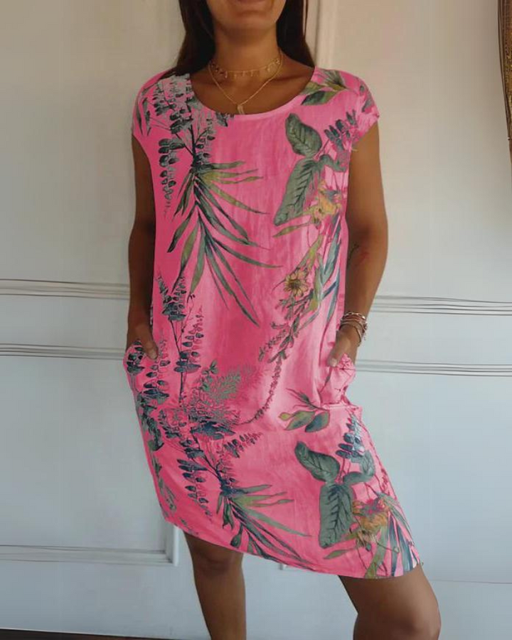 Stunning women's printed dress, combining elegance and casual comfort. A versatile round neck summer style.