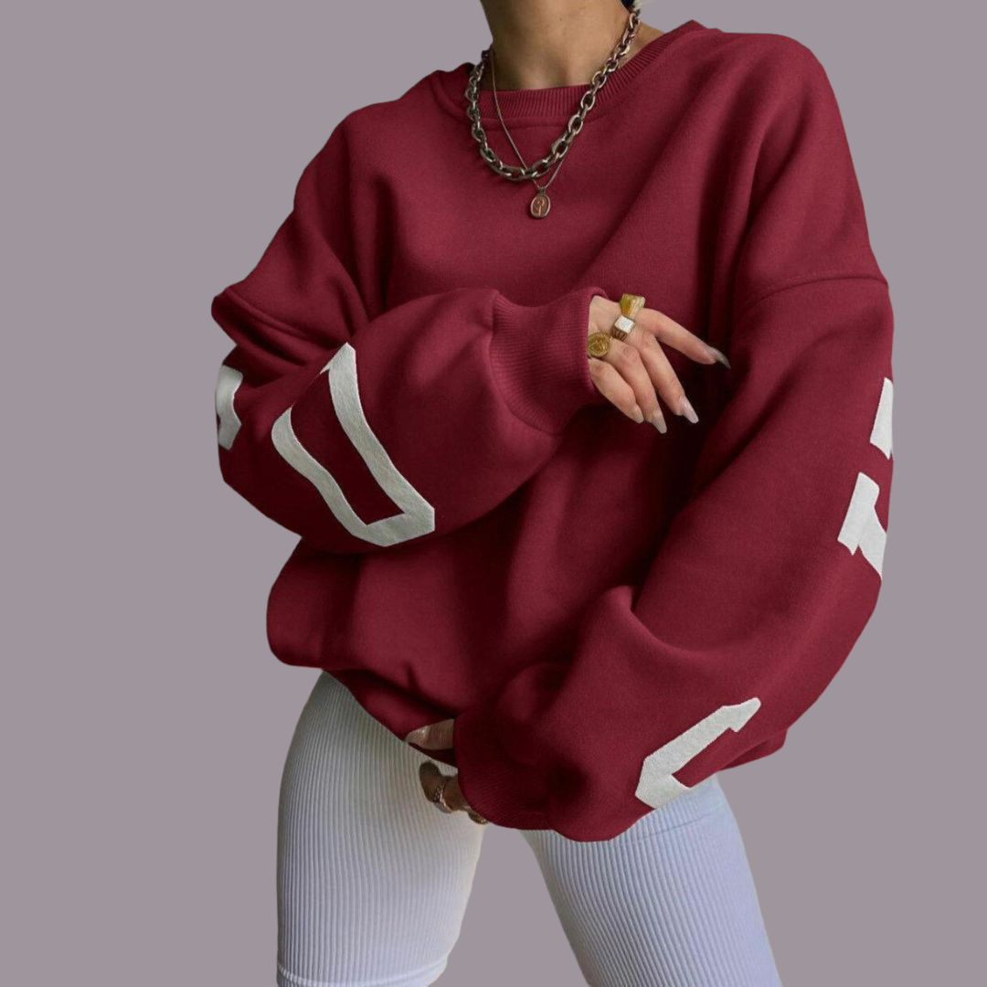 Oversized women's sweatshirt, comfy relaxed fit, perfect for casual everyday wear.