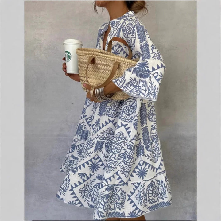 Women's floral print midi tunic dress, relaxed fit for comfortable casual wear. Perfect for spring & summer vacation.