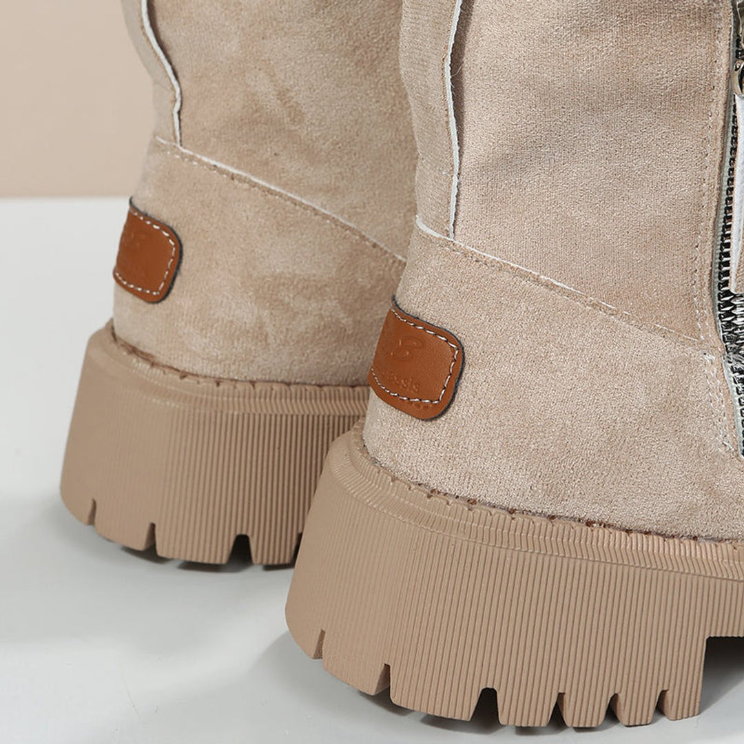 Casual women's slip-on ankle boots, featuring cozy warmth for cold winter weather.