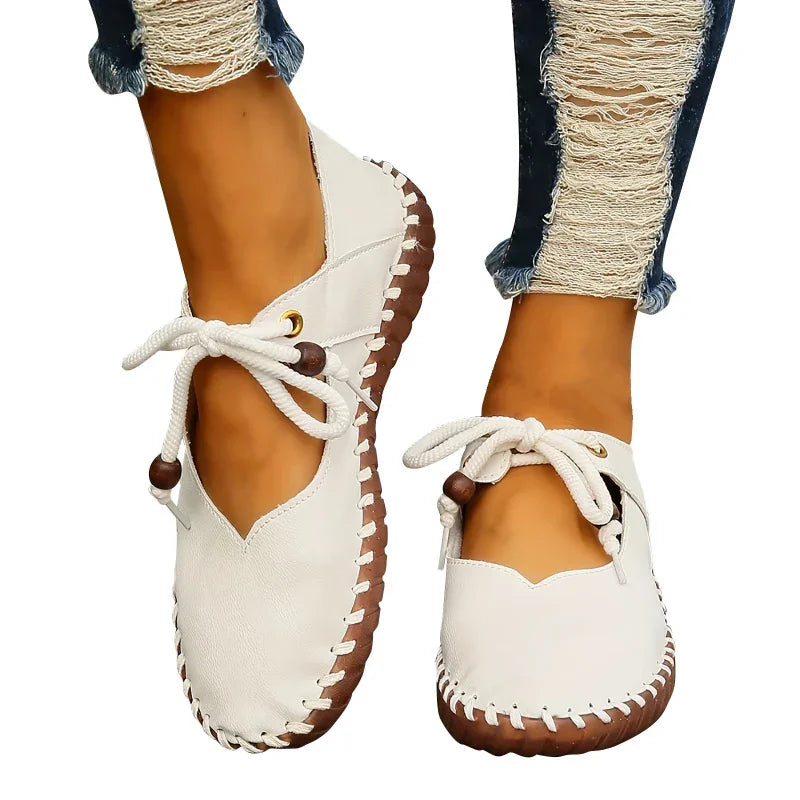 All-season women's wide toe box lace-up flats, providing bunion relief, dressy style, & comfort.
