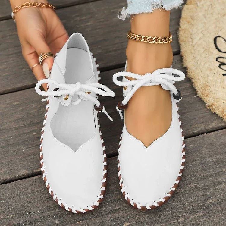 Elegant women's lace-up flats, wide toe box for bunion comfort, perfect for work or dressy occasions.