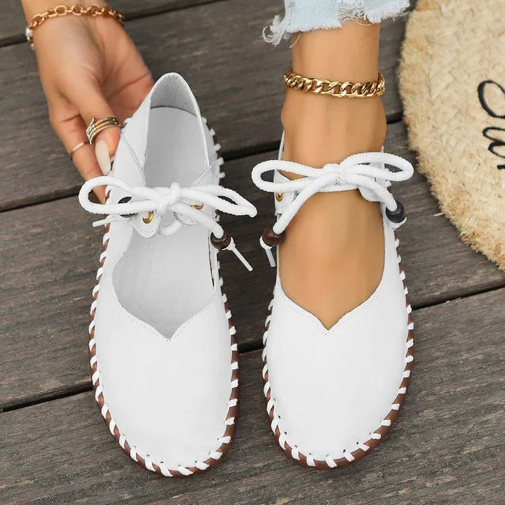 Elegant women's lace-up flats, wide toe box for bunion comfort, perfect for work or dressy occasions.