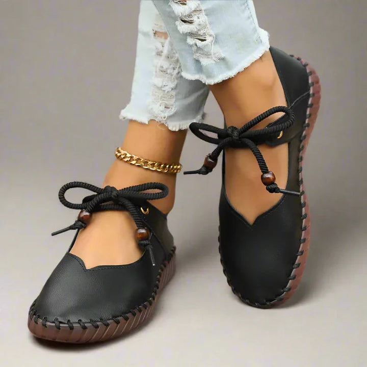 Stylish women's flats with bunion relief, wide toe box & lace-up design for all-day comfort.