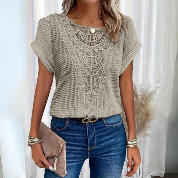 Women's elegant vintage top with intricate lace details, a chic long sleeve blouse design.