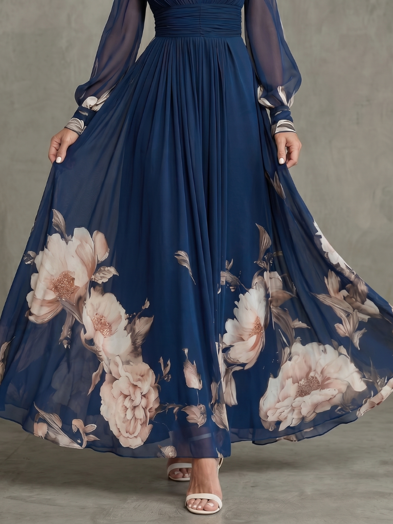 Elegant navy maxi dress with sheer pleated sleeves, ideal for parties, evening events, and formal occasions.