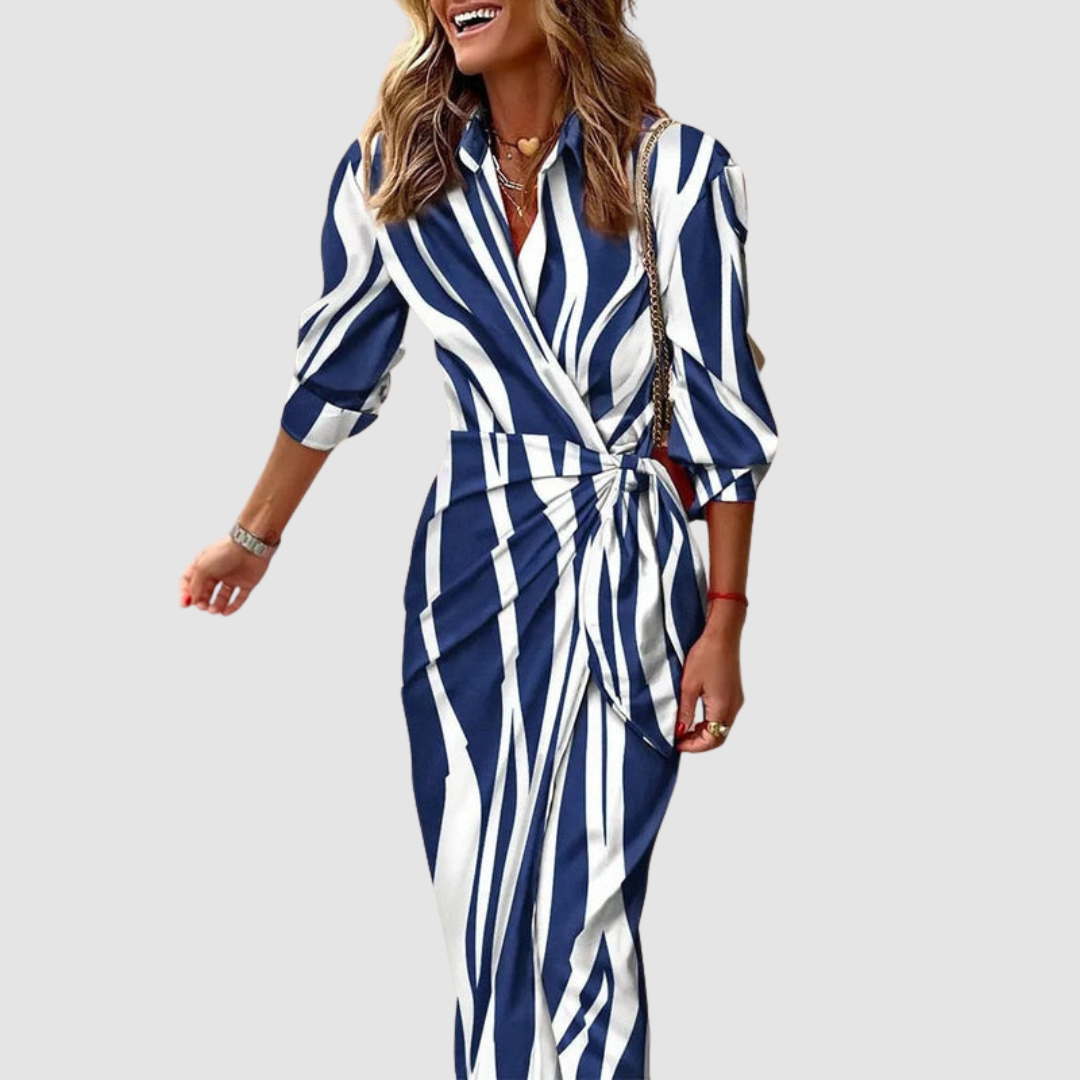 Versatile elegant women's striped midi dress. Comfortable, stylish fashion for spring/summer casual or office wear.