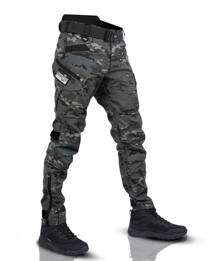 Rugged men's tactical adventure pants, multi-pocket design in black. Durable outdoor & functional workwear.
