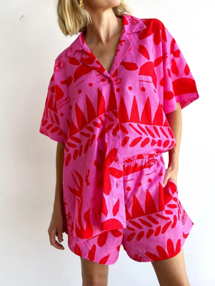 Women's pink short sleeve matching set, perfect for summer casual wear. Stylish two-piece outfit with relaxed fit.