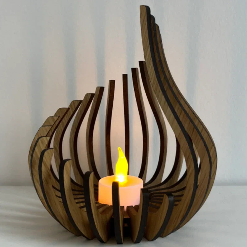 Close-up of a hollow carved wooden tea light holder, showcasing intricate wood art and design.
