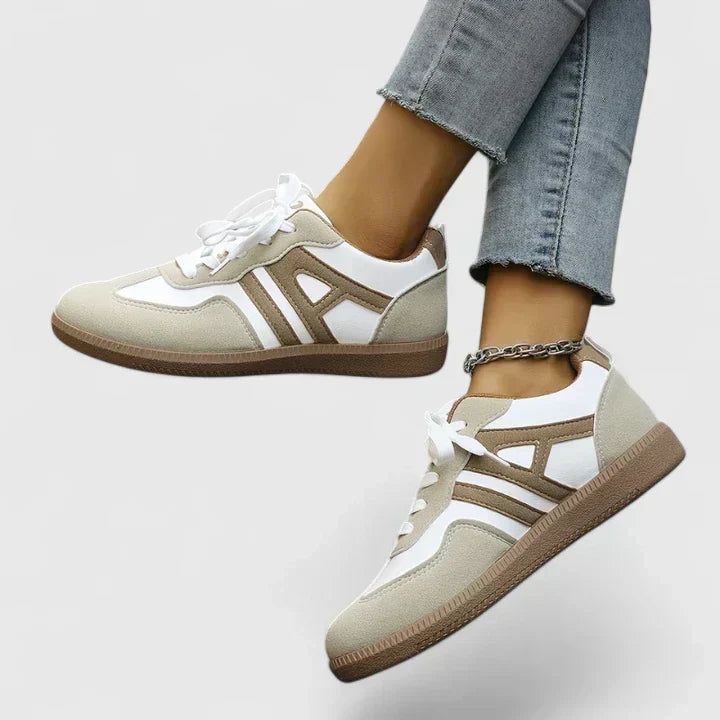 Supportive women's arch support sneakers, designed with orthopedic comfort and a wide toe box for walking.