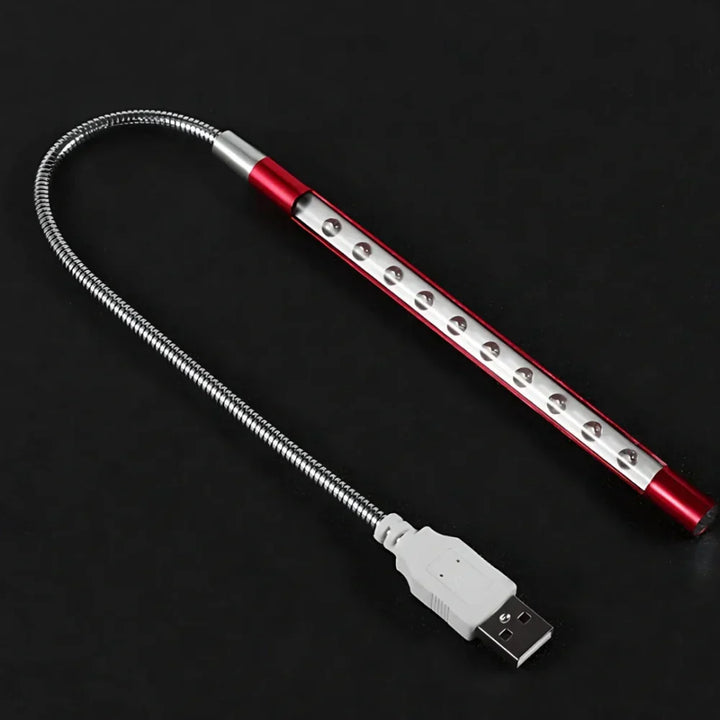 Modern USB LED task light with a flexible gooseneck, dimmable for optimal keyboard visibility.