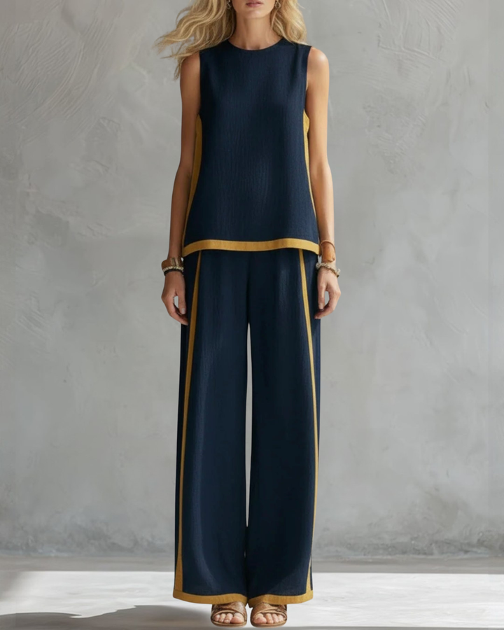Fashionable women's elegant set: sleeveless top & wide leg trousers. Versatile for any occasion.