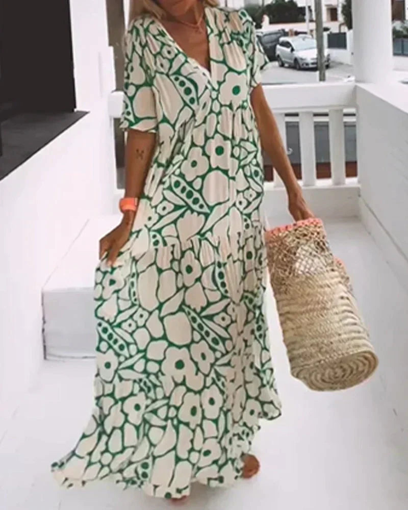 Back view of a women's comfortable and elegant flowy lightweight short-sleeve summer maxi dress.
