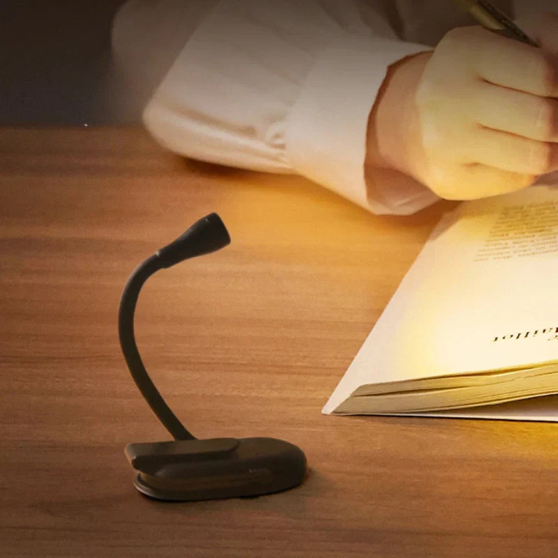 Eye-care dimmable LED book light, clip-on design, perfect for long reading sessions without strain.