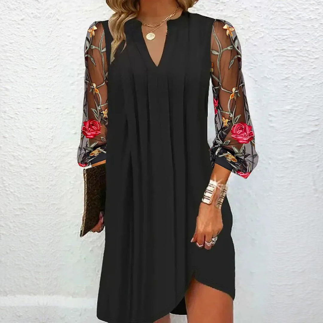 Elegant black V-neck dress for women, featuring chic floral sleeves. Perfect for formal events & evening parties.