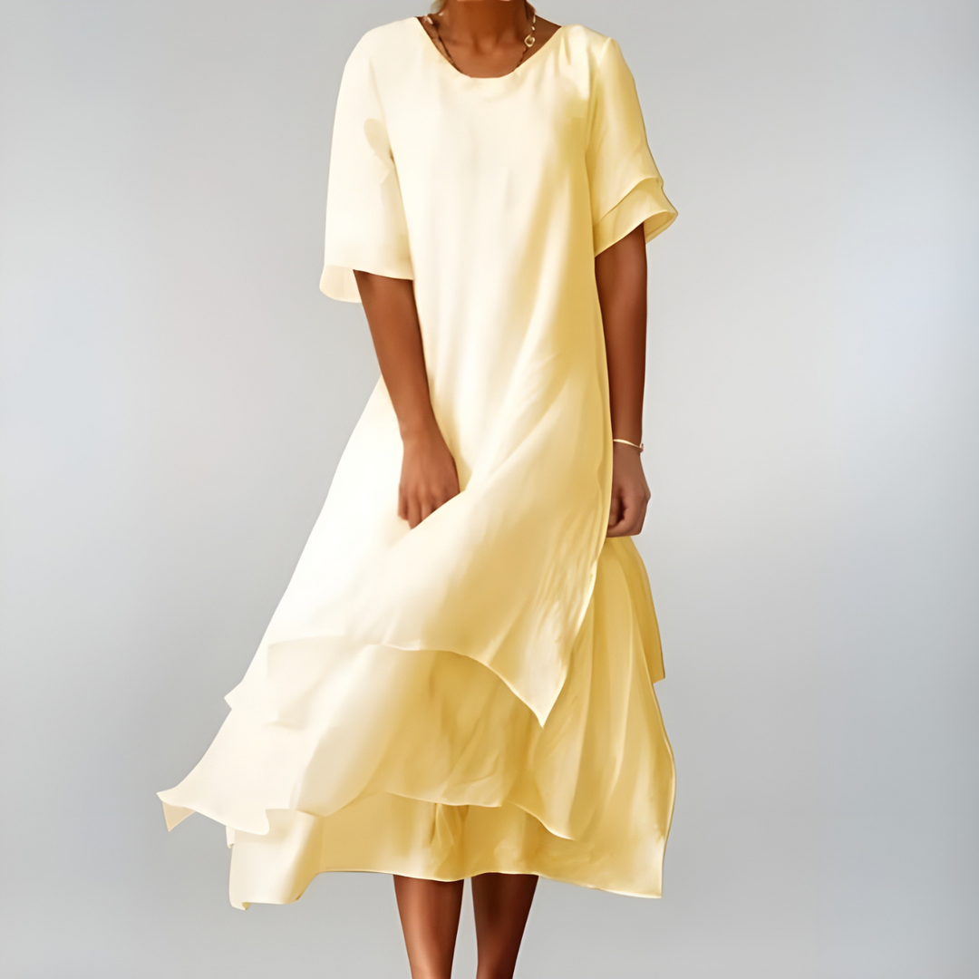White elegant maxi dress for women. Perfect lightweight vacation wear, comfortable for summer and casual chic.