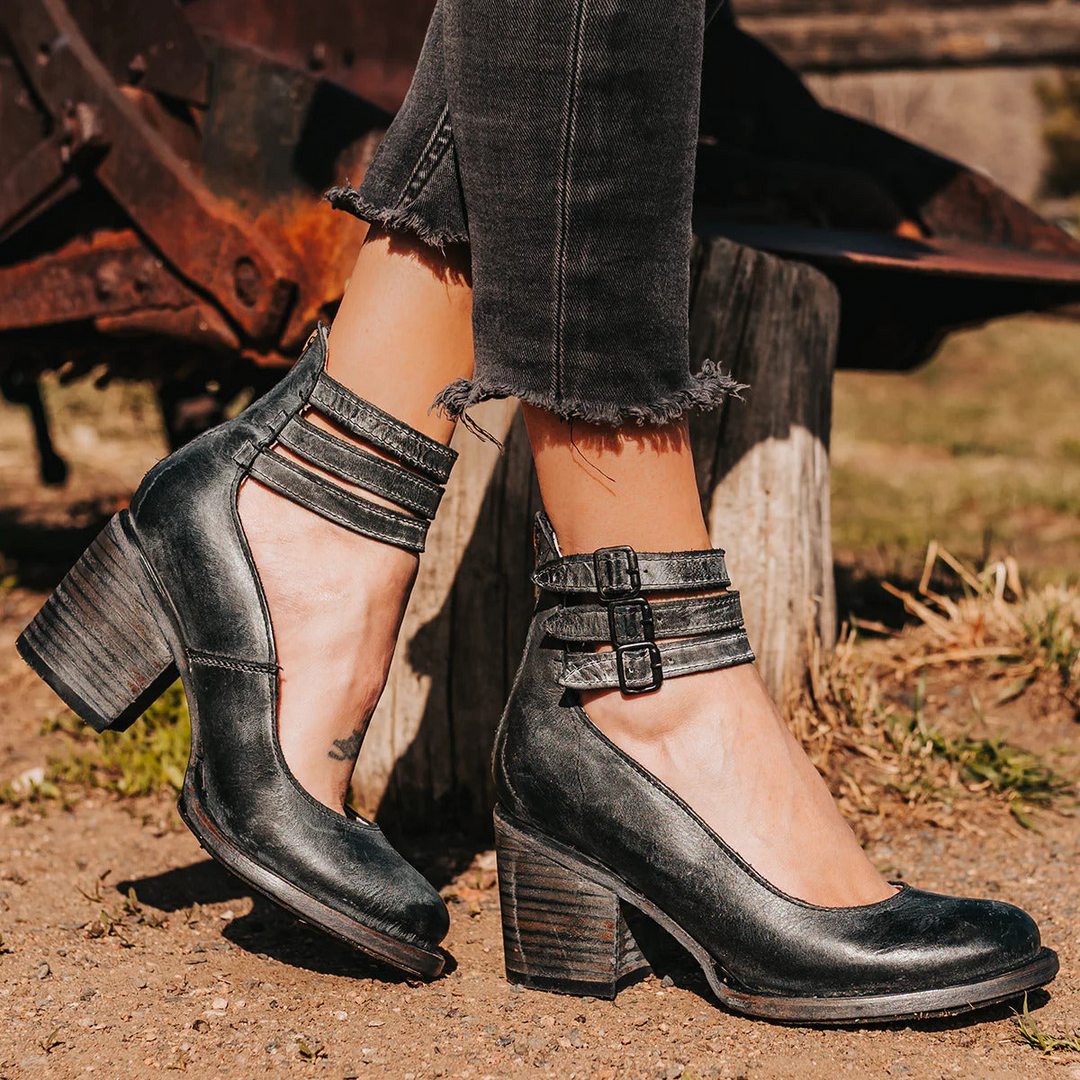 Comfortable women's orthopedic ankle boots with elegant strappy design and sturdy block heel.