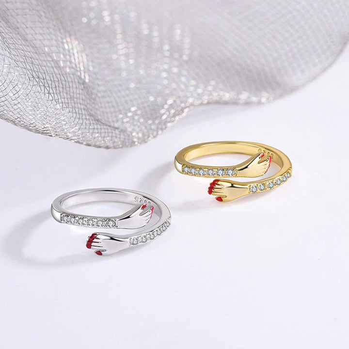 Silver alloy adjustable hug ring, a unique and meaningful love or friendship gift idea.