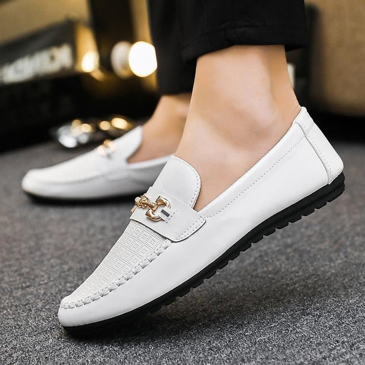 Versatile men's dress shoes, slip-on loafers with refined style suitable for business casual.