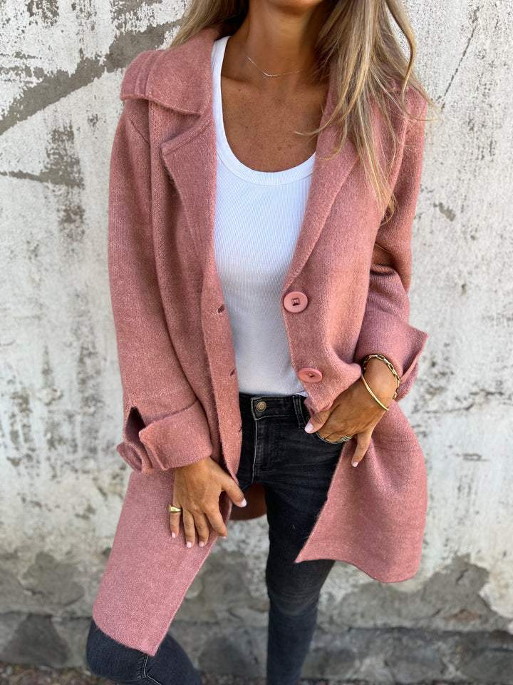 Elegant women's long button coat for autumn. Stylish fall fashion outerwear, perfect for chic ladies.