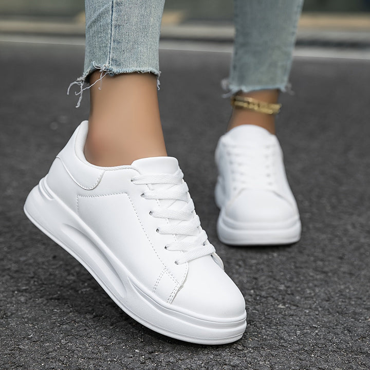 Lightweight women's walking shoes with arch support for comfortable daily strolls.