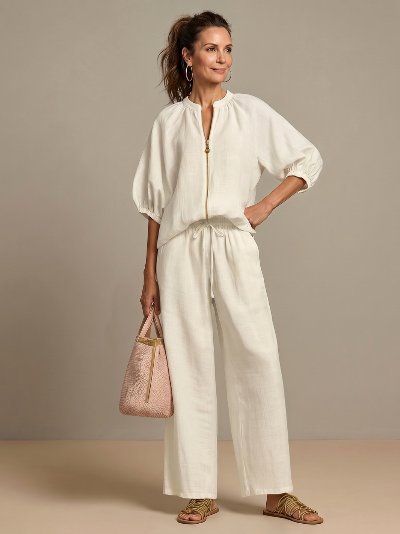 Versatile women's wide-leg pants, paired with a zip-front blouson top.