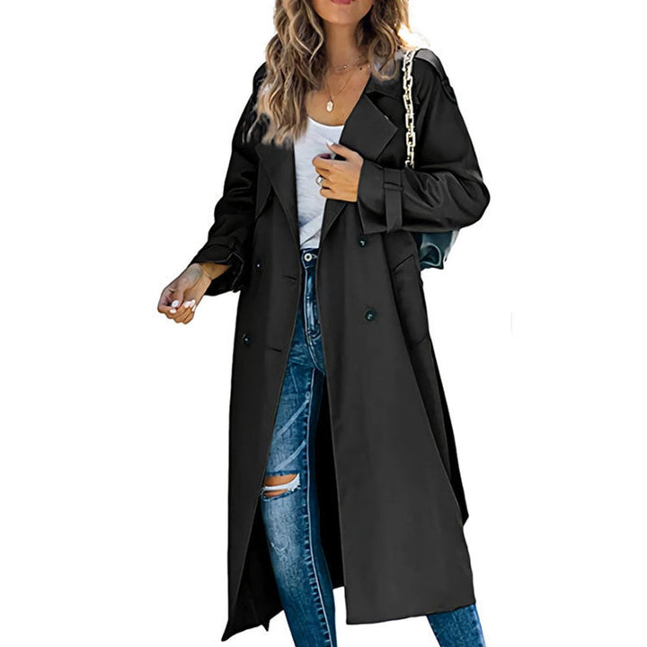 Women's oversized double-breasted trench coat, a sophisticated layering piece with a flattering tie belt.
