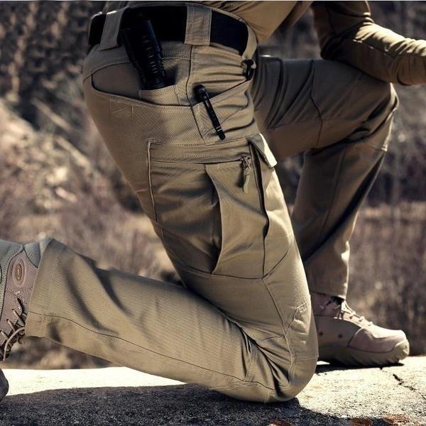 Versatile men's adventure trousers, tactical multi-pocket cargo pants for hiking and utility.