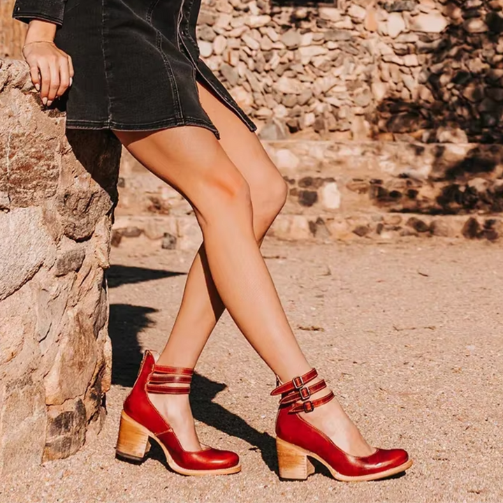 Stylish women's orthopedic ankle boots, strappy with buckles, round toe, and a comfortable block heel.