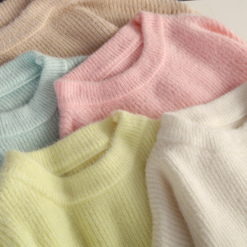 Cozy women's long-sleeve knit jumper in beige, a comfortable and chic layering piece for casual or elegant looks.