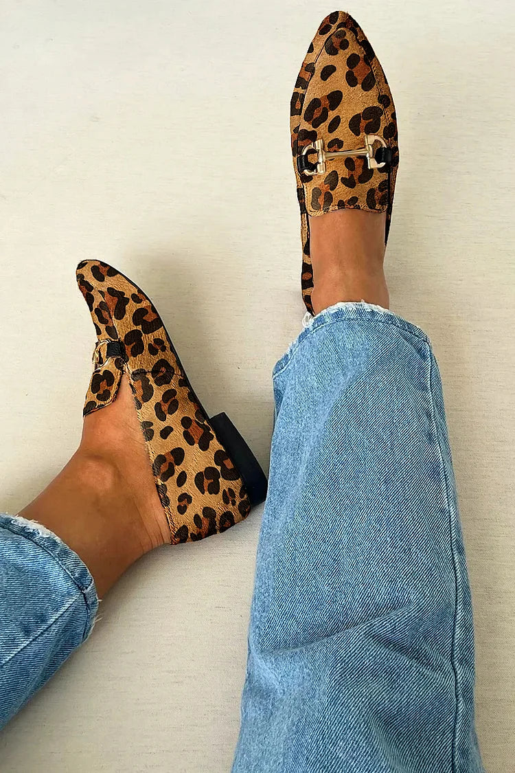 Stylish women's loafers featuring a subtle metallic accent. Comfortable slip-on shoes for everyday wear & travel.