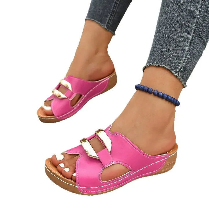 Supportive women's orthopedic slip-on wedge sandals for comfortable summer wear & foot health.