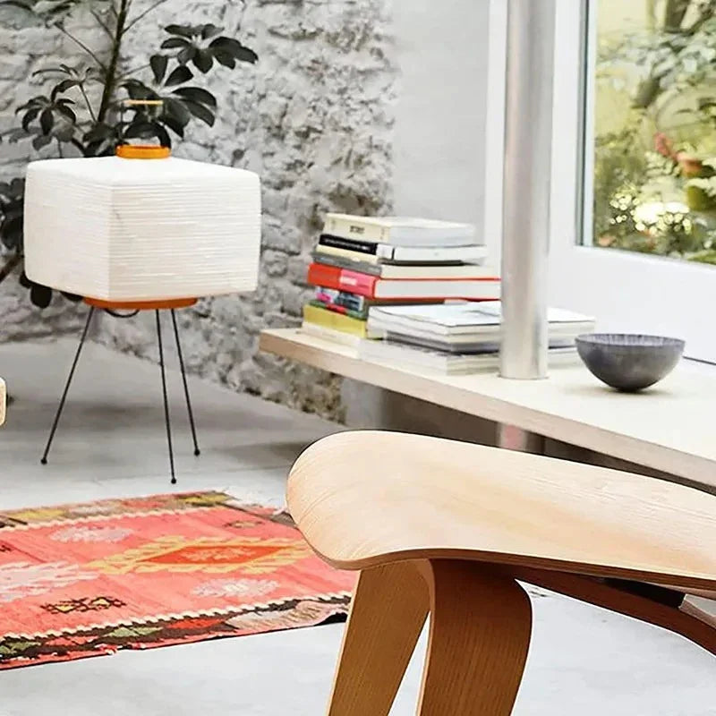 Sculptural modern floor lamp, Japanese style, providing soft ambient light for contemporary home decor.