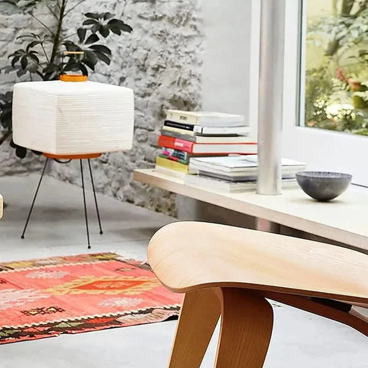 Sculptural modern floor lamp, Japanese style, providing soft ambient light for contemporary home decor.