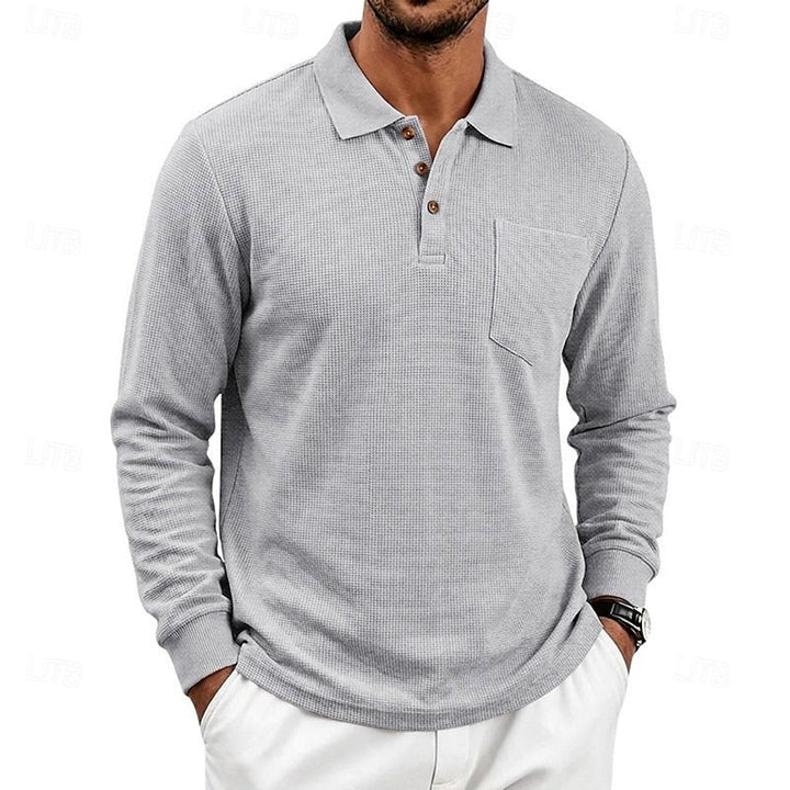 Elegant men's long-sleeve textured polo top. Smart-casual with a classic fit for versatile men's fashion.