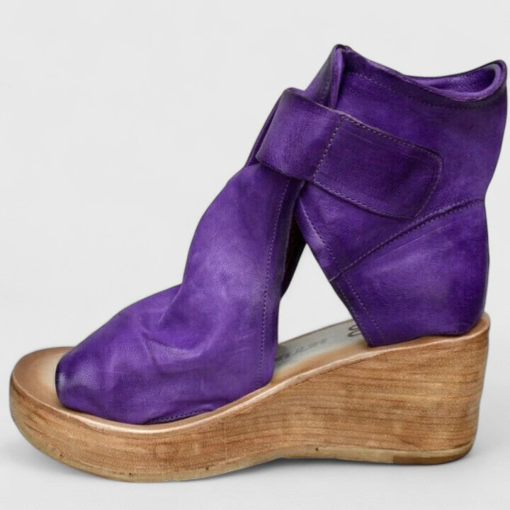 Comfortable women's orthopedic wedge sandals, offering arch support for all-day wear.