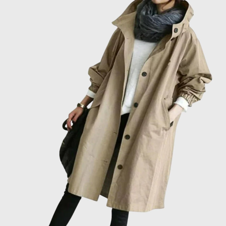 Versatile women's long hooded trench coat, great for travel, casual wear & elegant fall/spring fashion.