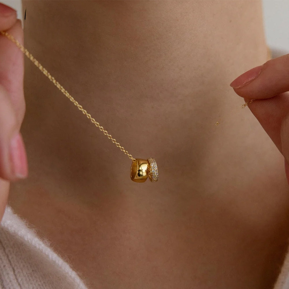 Elegant women's alloy necklace with a double circle pendant, featuring a unique duo ring design. Perfect minimalist jewelry.