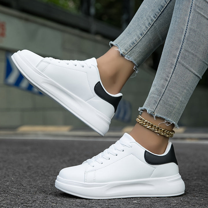 Women's comfort walking sneakers with arch support & responsive cushioned sole.