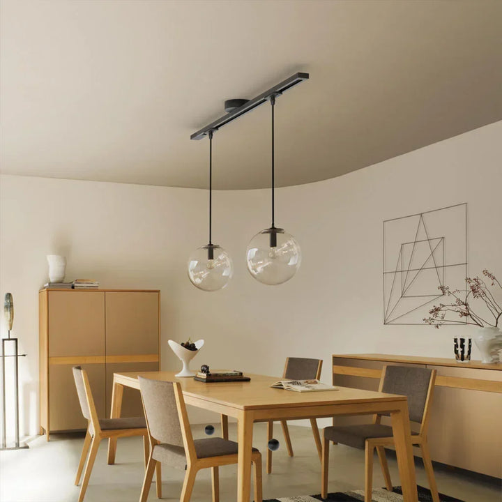 Stylish white pendant light rail. Customizable illumination for modern interior design.