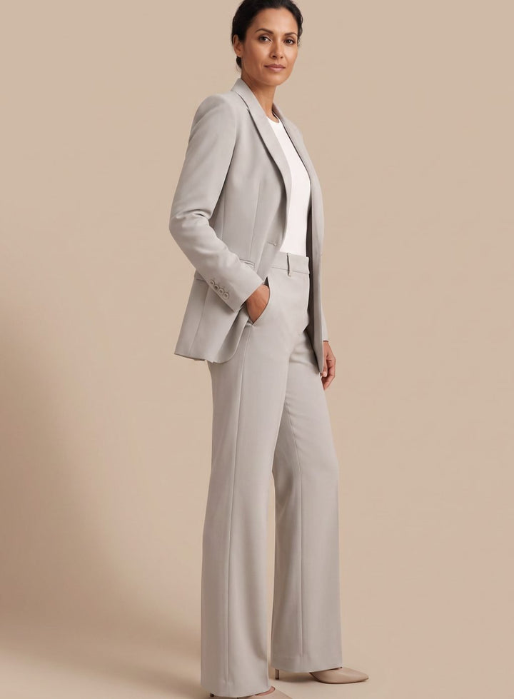 Women's elegant blazer and flared trousers two-piece set, ideal for a sophisticated professional office look.