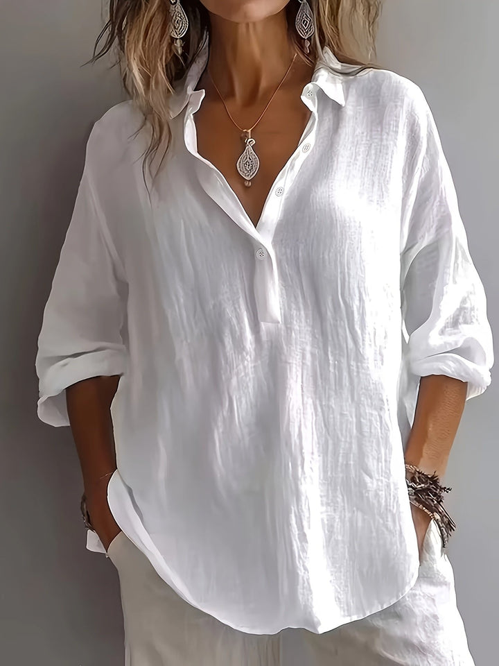 Versatile women's relaxed fit blouse. Chic collared shirt, perfect for everyday wear or work.