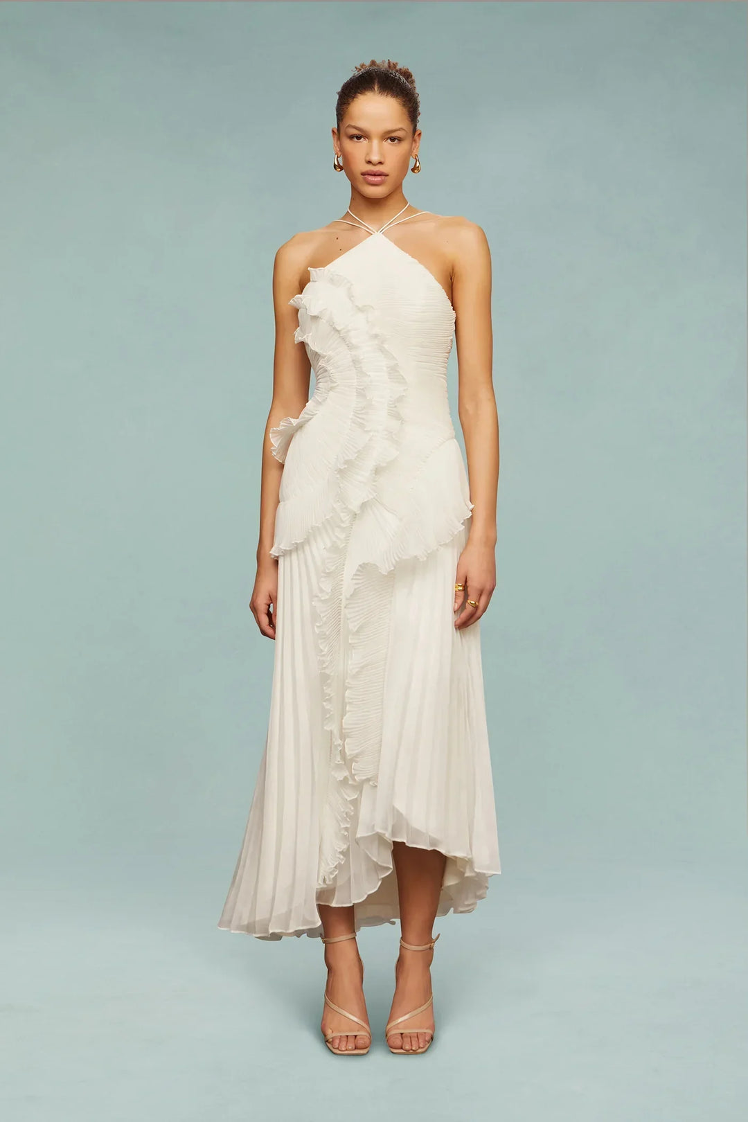 White wedding guest maxi dress with a sophisticated ruffled halter neck design, a formal evening gown.