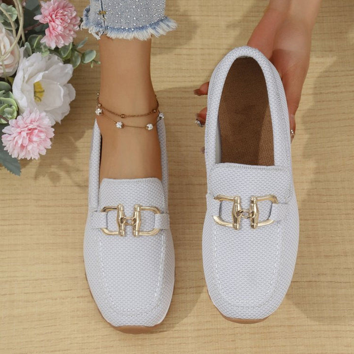 Women's minimalist flat sneakers, solid color, lace-up, perfect for everyday casual comfort and style.