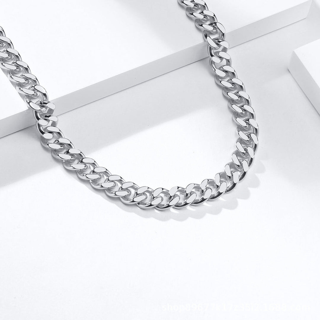 Chic unisex minimalist gold-tone accessory set. Modern necklace & bracelet for versatile, simple everyday fashion.